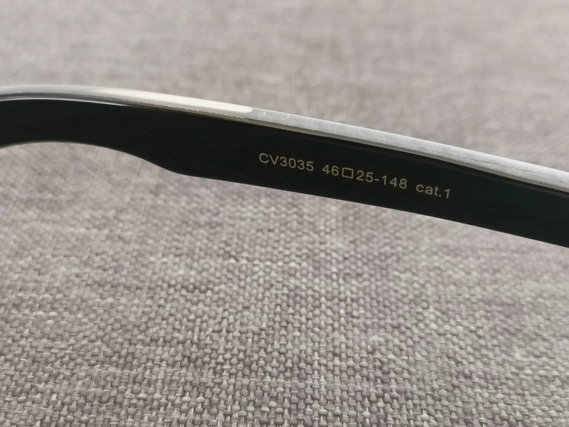 Black pantos glasses with green lenses