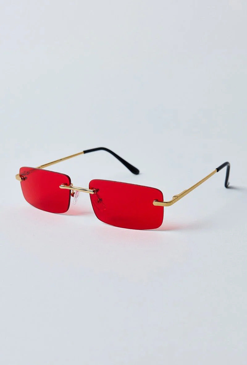 Lunettes de soleil rectangulaires à verres sans monture rouges
