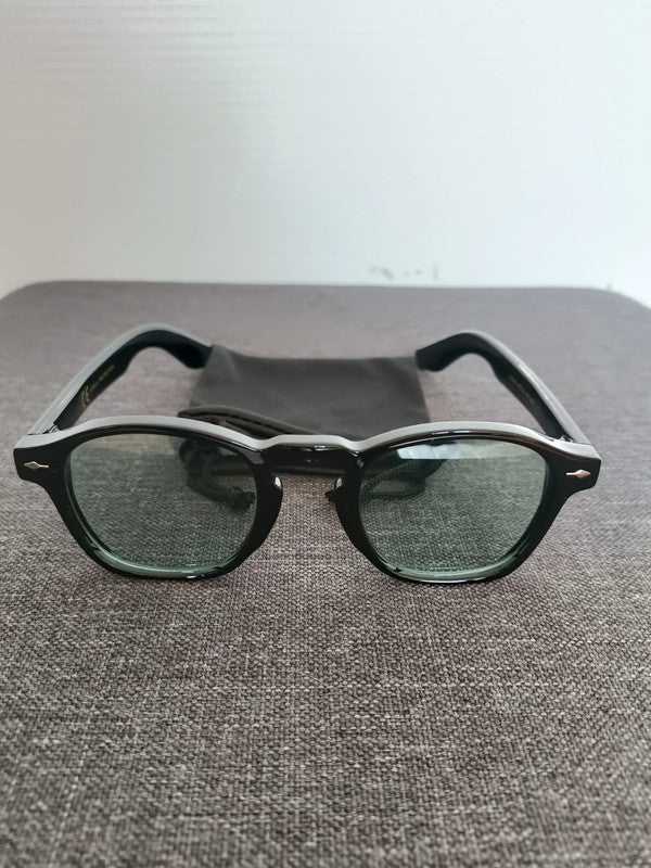 Lunettes pantos noires verres verts