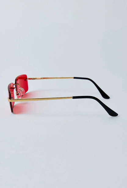 Lunettes de soleil rectangulaires à verres sans monture rouges