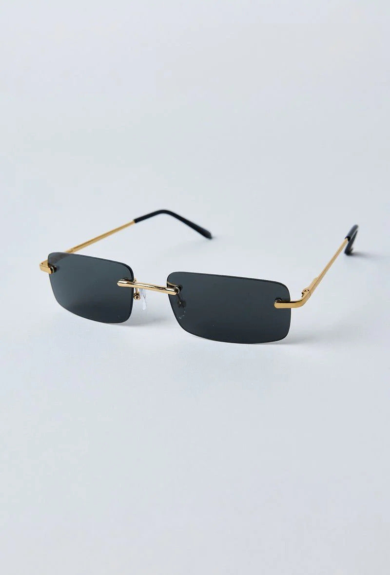 Vue face lunettes de soleil rectangulaires à verres sans monure noirs - GL BOUTIK