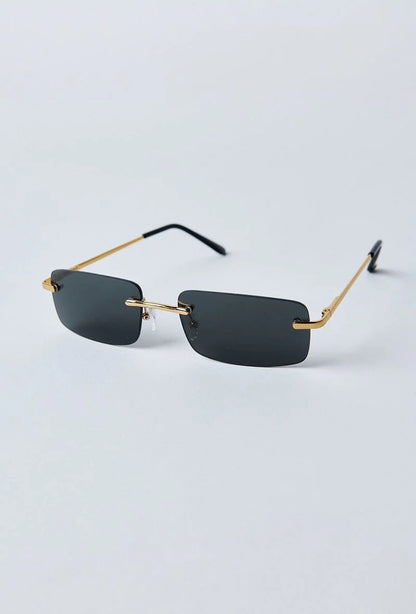 Vue face lunettes de soleil rectangulaires à verres sans monure noirs - GL BOUTIK
